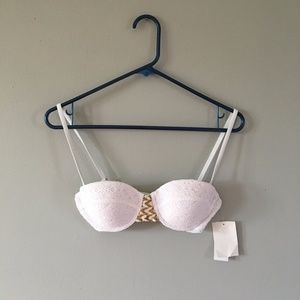 White eyelet bikini top with gold embellishments